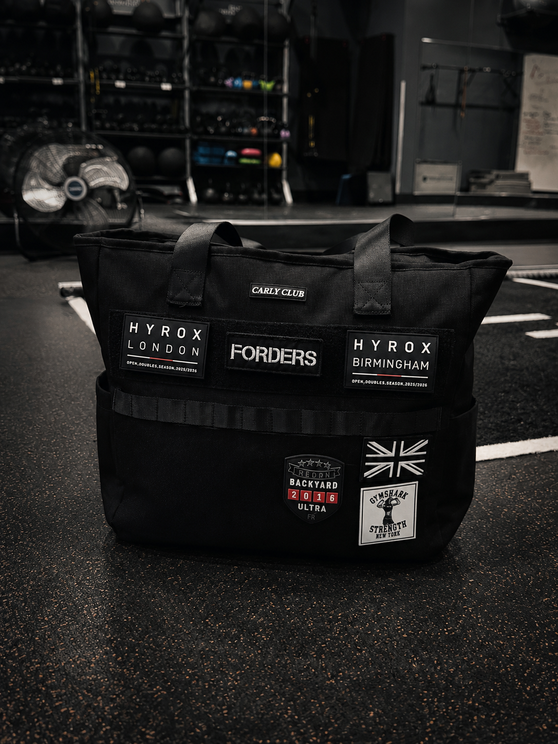 Athlete carrying the Carly Club Tote race day and gym bag during a training session